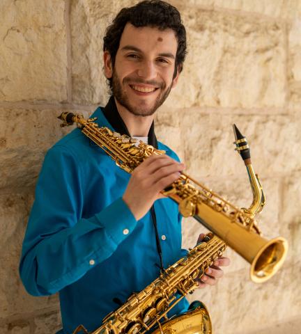 Bryce Wilson with saxophones