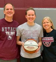 Abby Schmidt with her parents, Matt and Amy Schmidt, after Abby joined the 1K/1K Club