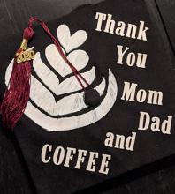 The decorated back of Courtney Simpson's commencement hat