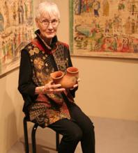 Reinhild Janzen with birth ritual clay pots from Uganda